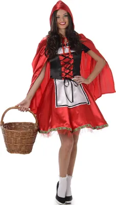 A woman is posing in a costume.