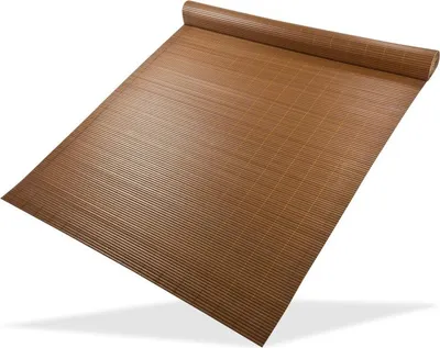 A rolled-up brown bamboo mat on a white background.