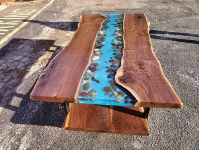 Produktbild von Eleganter Couchtisch 140×70×50 aus klarem Epoxidharz und Holz