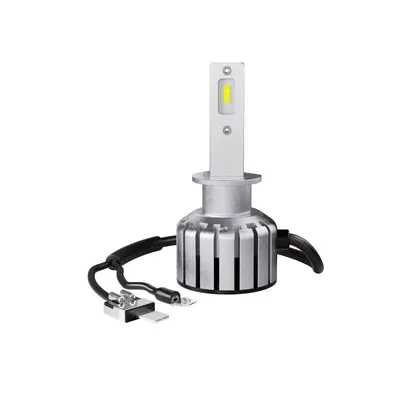 A close-up studio shot of a single LED headlight bulb against a white background.