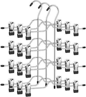 A set of tiered hangers with clips for hanging pants or skirts.
