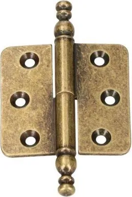 A close-up studio shot of an antique brass hinge against a white background.