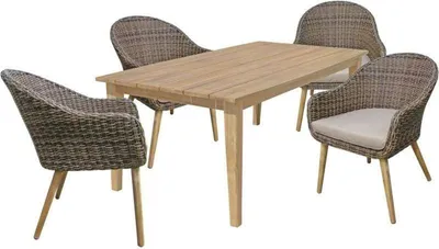 A wooden dining table with four wicker chairs around it, set against a white background.