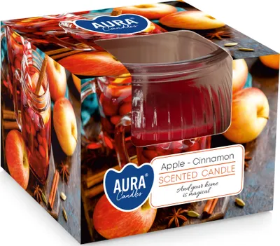 A product shot of an apple cinnamon scented candle in its packaging, with a clear window showing the candle inside. The packaging is decorated with images of apples, cinnamon sticks, and spices.