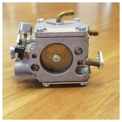 Image de Carburateur compatible avec les tronçonneuses Husqvarna 385 et 390XP