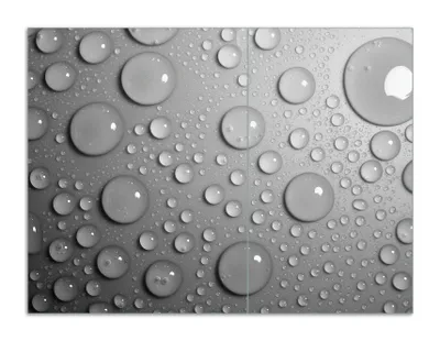 Produktbild von Wallario Herdabdeckplatte aus Glas, Größe 70 x 52 cm 2-teilig, Motiv Wassertropfen in schwarz weiß