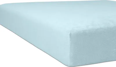 A light blue fitted sheet is shown from an angle against a white background.