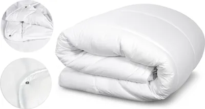 A white duvet is folded and displayed against a white background.