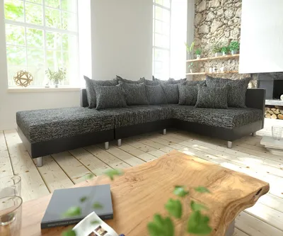 Produktbild von DELIFE Ecksofa Clovis Schwarz mit Hocker Ottomane Rechts Modular