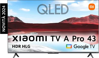 A television screen displaying a landscape image, with text overlays and logos.