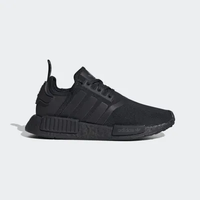 A black Adidas NMD_R1 J sneaker shown from the side against a white background.