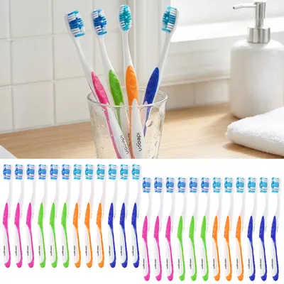 Produktbild von Zahnbürsten 24er-Pack mit Zungenreiniger – Medium Handzahnbürsten Set in 4 Farben für die Familie – Rutschfester Griff für optimale Pflege