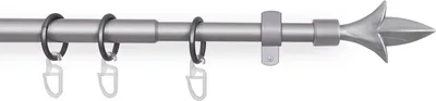 A close-up view of a silver curtain rod with rings and a decorative finial.