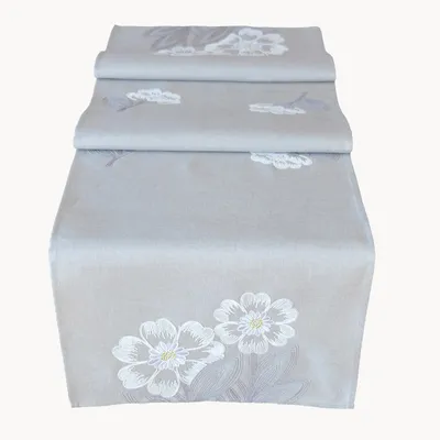 Produktbild von Tischwäsche mit Stickerei Blüten und Blätter 40 x 140 cm