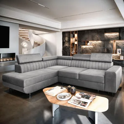 A modern living room with a large sectional sofa, a spiral staircase, and a fireplace.