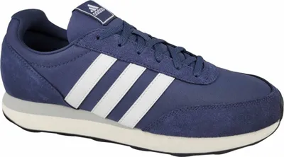 A side view of a blue Adidas sneaker with white stripes.