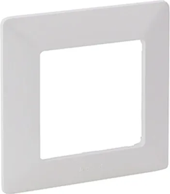 A white frame for an electrical outlet or switch.