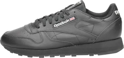 A side view of a black Reebok Classic Leather sneaker.
