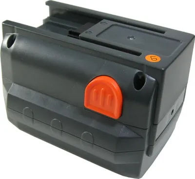 A black and orange battery pack for a power tool, shown from a slightly elevated angle against a white background.
