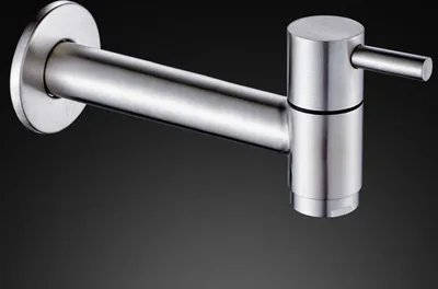 A close-up studio shot of a stainless steel wall-mounted faucet against a dark gradient background.