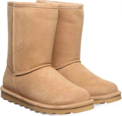 A pair of tan winter boots.
