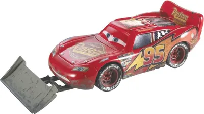 A toy car with a snow plow attachment.