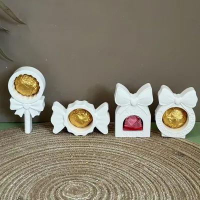 Image de Moule en silicone 4 pièces pour réaliser des nœuds, idéal pour les cadeaux en argent, les bonbons, le plâtre, les boîtes à chocolats et les projets de bricolage.