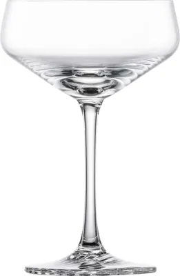 A clear, studio shot of a single cocktail glass against a white background.
