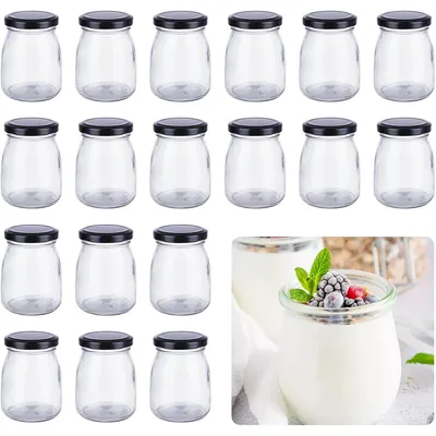 A collection of empty glass jars with black lids, and a close-up of two jars filled with yogurt and berries.