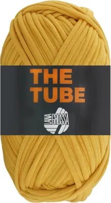 A ball of yellow yarn with a black label.