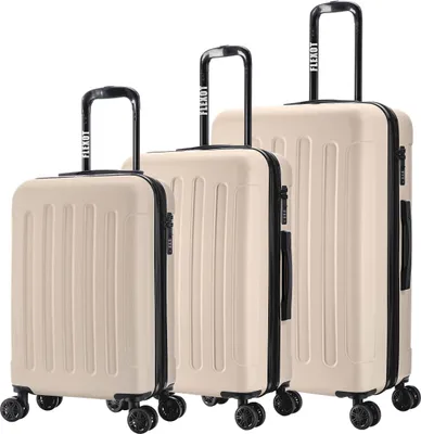 Three suitcases of varying sizes arranged diagonally on a white background.