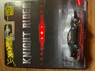 A Hot Wheels K.I.T.T. toy car in its packaging.