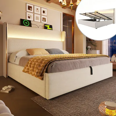 A bedroom scene featuring a large upholstered bed with integrated lighting and bedside charging stations.