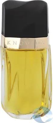 A perfume bottle with yellow liquid inside and a black cap.