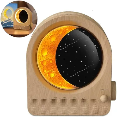 A wooden alarm clock with a moon and starry night display.