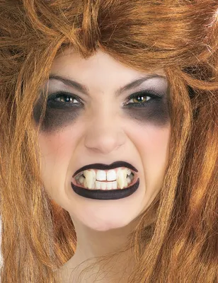Immagine prodotto di Denti da vampiro a punta canini per la personalizzazione 2 pezzi bianchi - taglia unica