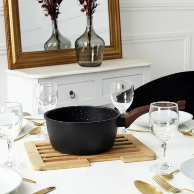 Image de Dessous De Plat Extensible 20-30cm En Bambou