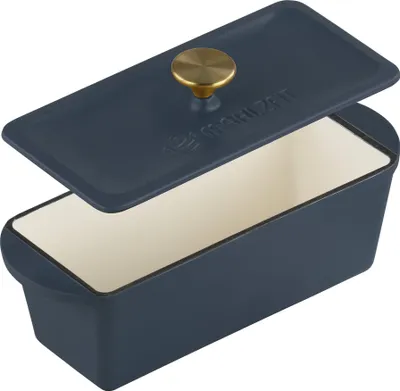 A blue cast iron loaf pan with a lid, shown from a slightly elevated angle.