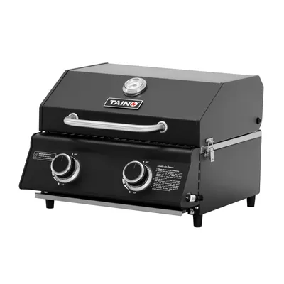A black TAINO PLATINUM COMPACT DARK Tischgrill 2 Brenner Gasgrill Kompakt Camping BBQ is shown on a white background.