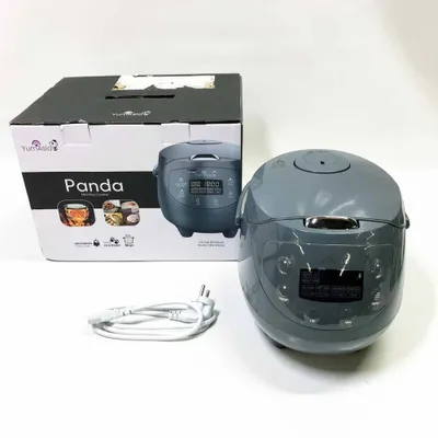 A product box and a rice cooker are displayed on a white background.