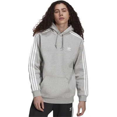 A man wearing an Adidas hoodie.