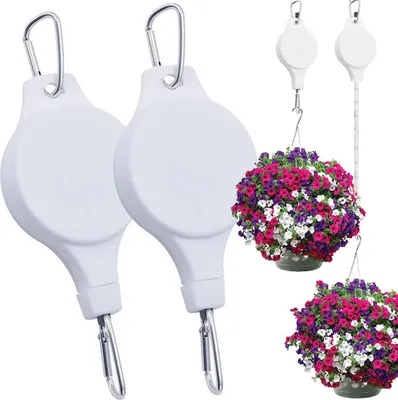 Two white retractable plant hangers are shown, with two hanging baskets of colorful flowers displayed to demonstrate their use.