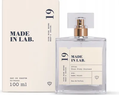 A bottle of perfume and its packaging are displayed against a white background.