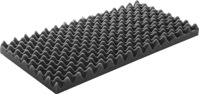 A close-up, angled view of a piece of dark gray foam with a wavy, corrugated texture, isolated on a white background.
