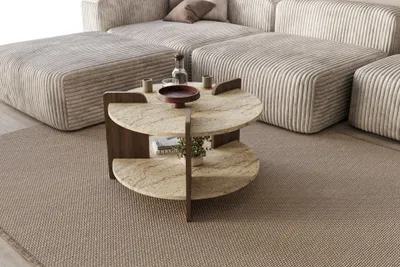 A modern living room setting with a sectional sofa and a coffee table.