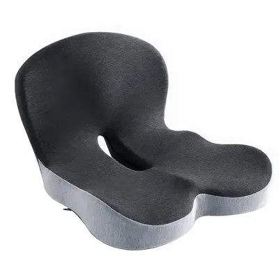 An orthopedic seat cushion with a cut-out for the tailbone, shown on a white background.