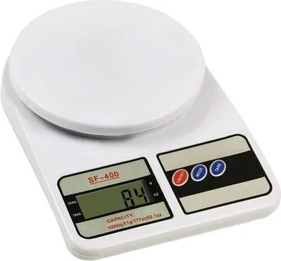 A white kitchen scale shown from a slight diagonal angle.