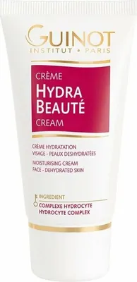 A product shot of a tube of face cream against a white background.