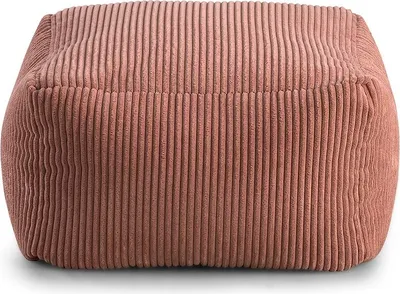 A close-up studio shot of a pink corduroy ottoman.