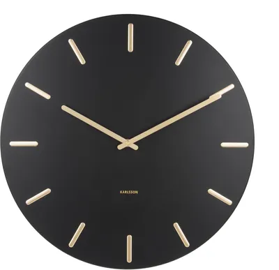 A black wall clock with gold hour markers and hands, presented against a white background.